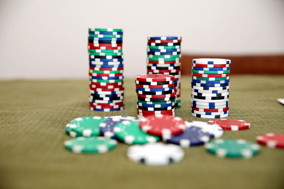 Casino card table with dealer and chips